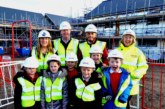 Village pupils tour construction site as new homes take shape