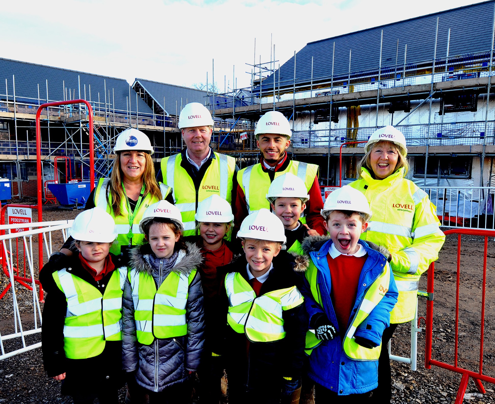 Village pupils tour construction site as new homes take shape