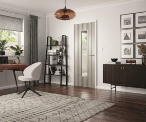 The Aria range of internal doors from JB Kind is based on the trend for fluted wall panels and furnishings with rails framing the door